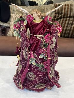 Decorative burgundy velvet angel Christmas tree topper. 13.75” Tall