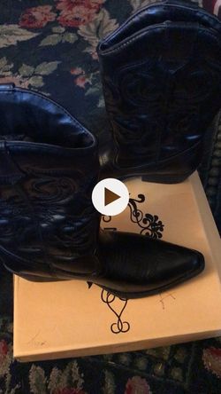 Black pair of black girl boots