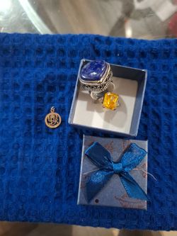 10k gold pendant and silver rings
