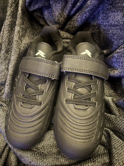 New boys soccer cleats color black size 11