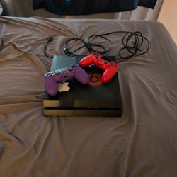 PS4 Console + 2 Controllers + Cords – Good Condition