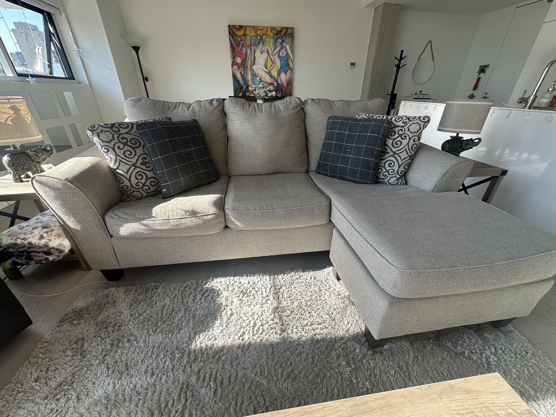 Ashley Reversible Sectional Couch (sold with 4 pillows)