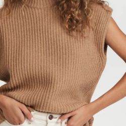 ## New without tag ##   Ganni Mock Tan Neck Sweater Vest  Fabric: Heavyweight ribbed knit Turtleneck Color : camel  Split high-low hem Shell: 60% recy