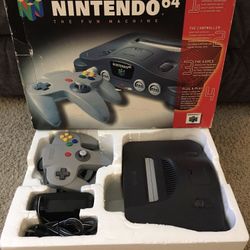 Nintendo 64 Console with controller, cords and original box with original proof of purchase card
