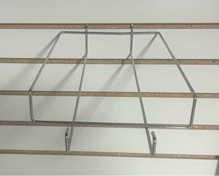 200 pieces slatwall hat display racks. Excellent condition. $250 obo.