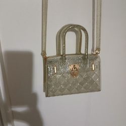Cute Heavy Plastic Hand Bag. Pethaps For A Child. Removable Strap. Silver Colored. New. Never Used