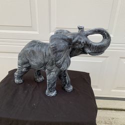 Medium sized walking elephant Statue