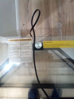 44" smart TV with remote and glass stand