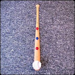 Baseball bat coat and hat rack