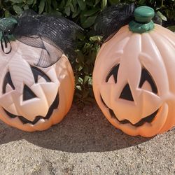 Two vintage pumpkin blow molds