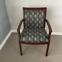 Chair with cushions and armrest