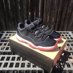 Jordan 11 Retro Low Bred 