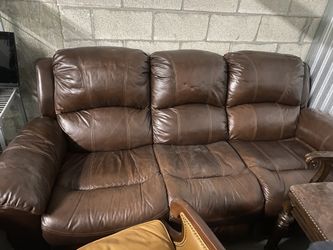 Multiple couches and table in storage