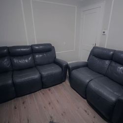 Black leather Sofa Three Seater & love Seat!