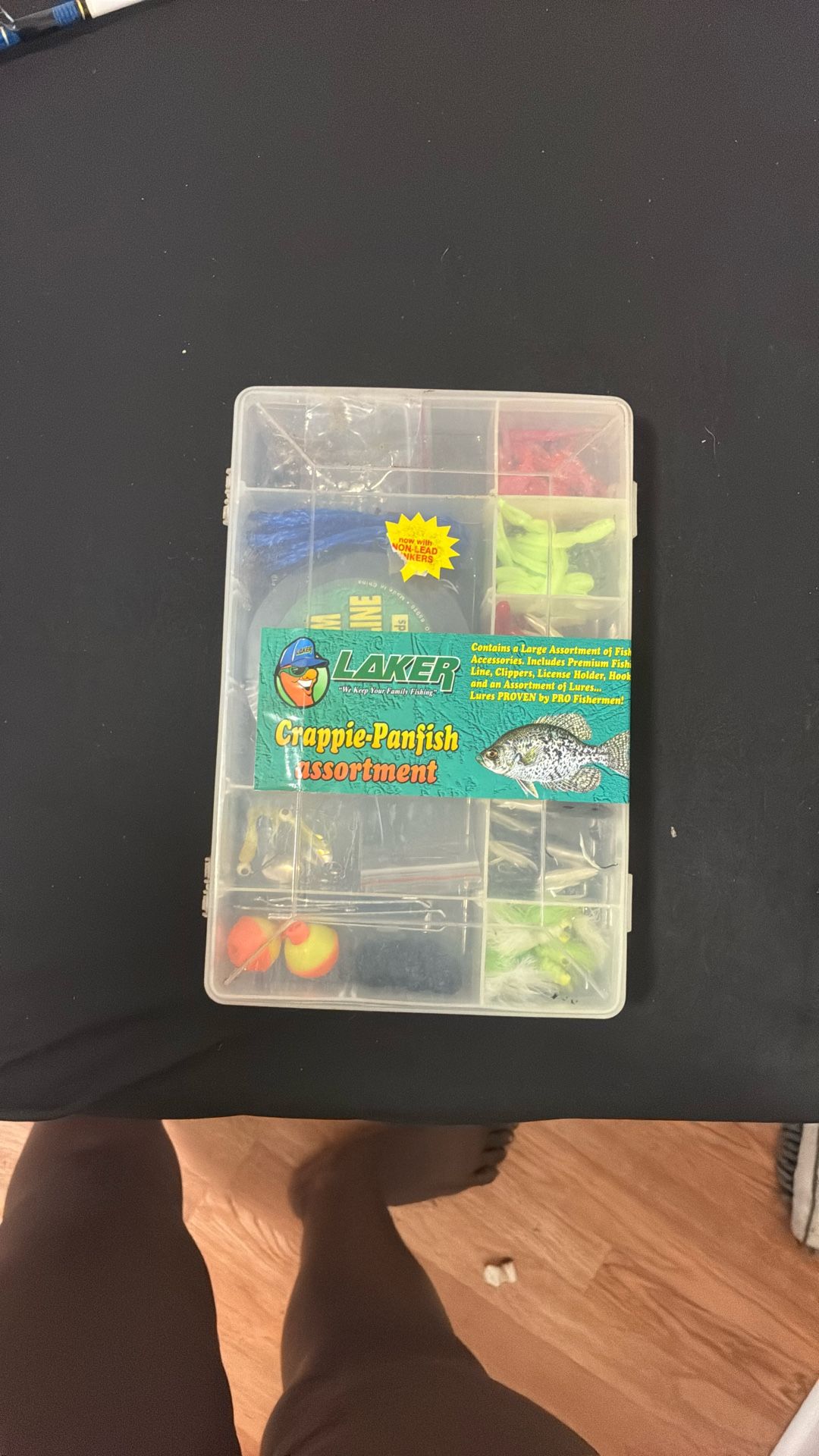 fishing rod and box with fishing stuff