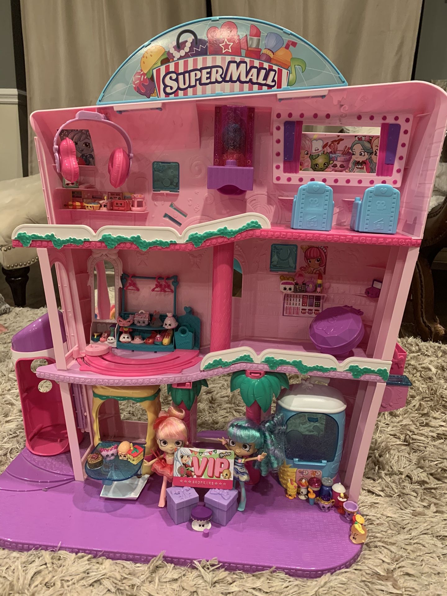 Shopkins Super Mall with 55 Shopkins and two dolls. $50