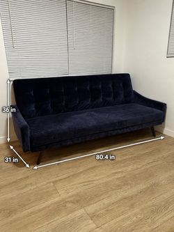 **Title:** Mid-Century Modern Blue Velvet Futon Sofa Bed – Used, As-Is