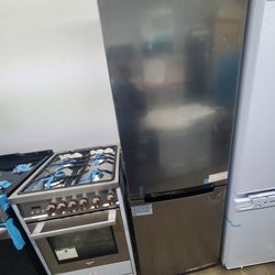 fridge stove 24 inches convention broil stainless small dent on fridge and stove special prices both item pick up only..$1499