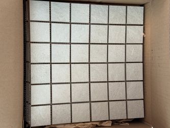 50 sq ft of mosaic tile with 4 boxes of 12x24