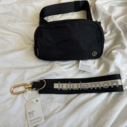 Lululemon Everywhere Belt Bag Brand New And Never List Keychain Black Gold