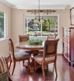 Round dining room table and 4 chairs.