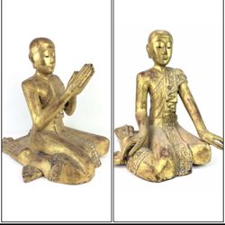 Two old Thai or Burmese Seated and praying Buddhist monks