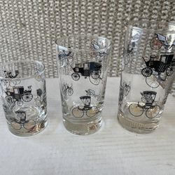 21 pice Libbey Glass Company:depicts various antique automobiles and horse-drawn carriages