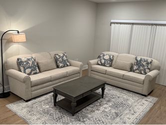 Sofa set with matching rug and coffee table