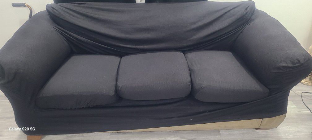 300$ Obo Brown Couch With Black Dust Covers 
