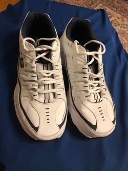 Pair of sketcher memory foam white tennis shoes