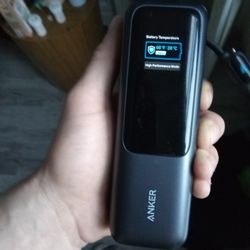 Anker Laptop Power Bank (25K, 165W) with built-in and retractable cables. 