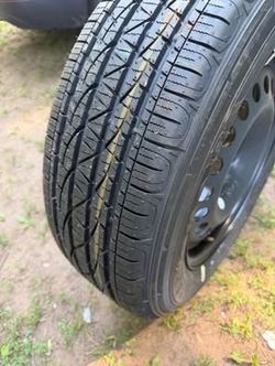 Car Tire on Steel Rim