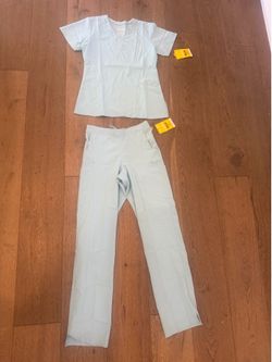 Sky blue wink 123 XS scrub set- new with tags