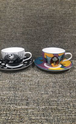 2 Sets of Disney tea cups With Saucers