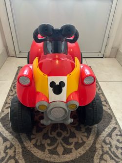Disney Mickey Mouse Hot Rod toddler ride-on toy by Kid Trax.