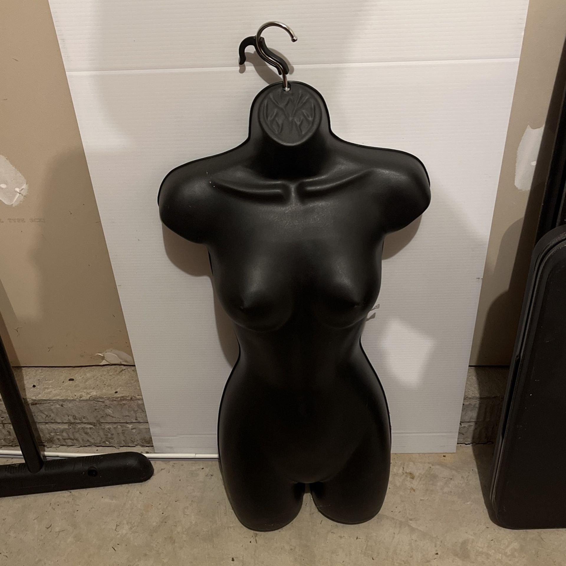 Hanging mannequin clothes display