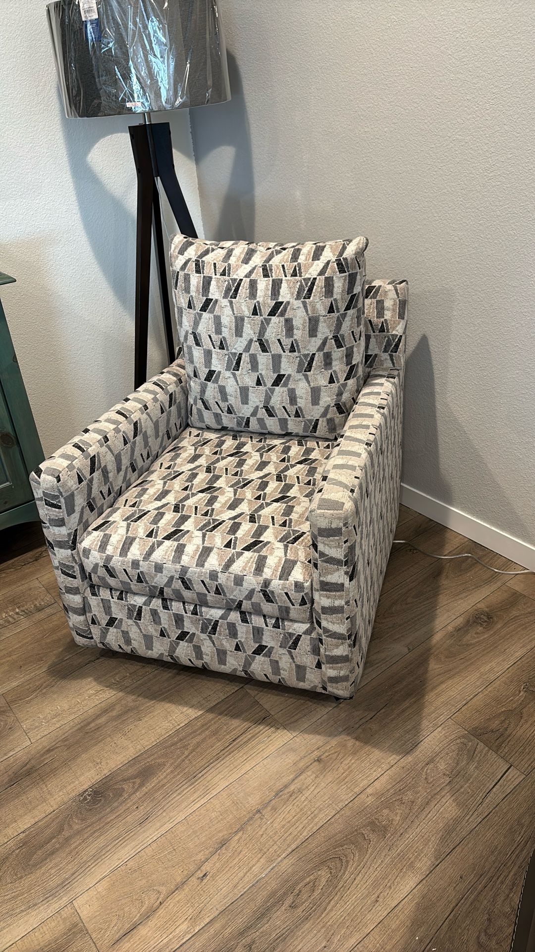 Living Spaces Swivel And rocking chair