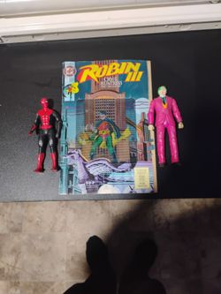 2 Action Figures And Comic Book 