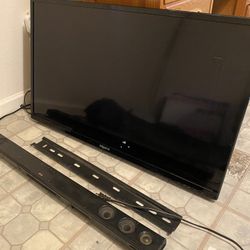 40 Inch Led Tv With Wall Mount Also Have A Sound Bar And Blu-Ray Player