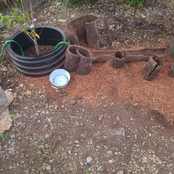 Yard bird/planners and hose hiders.