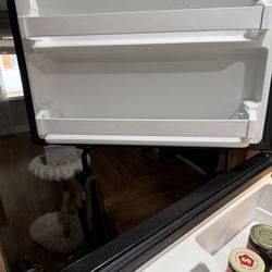 Black Refrigerator In Perfect Condition And Works Great. Just Use.