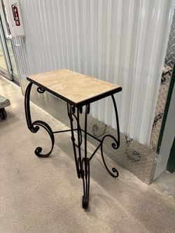 Wrought Iron  entryway table with ceramic top 24” wide , 12” depth , 29 “ high $50