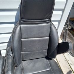 Two Leather Cabin Chairs With Armrest