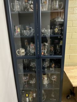 Glassware cabinet $150