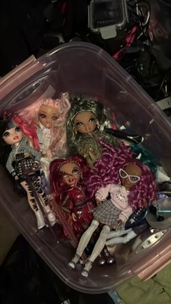 Container of rainbow high dolls