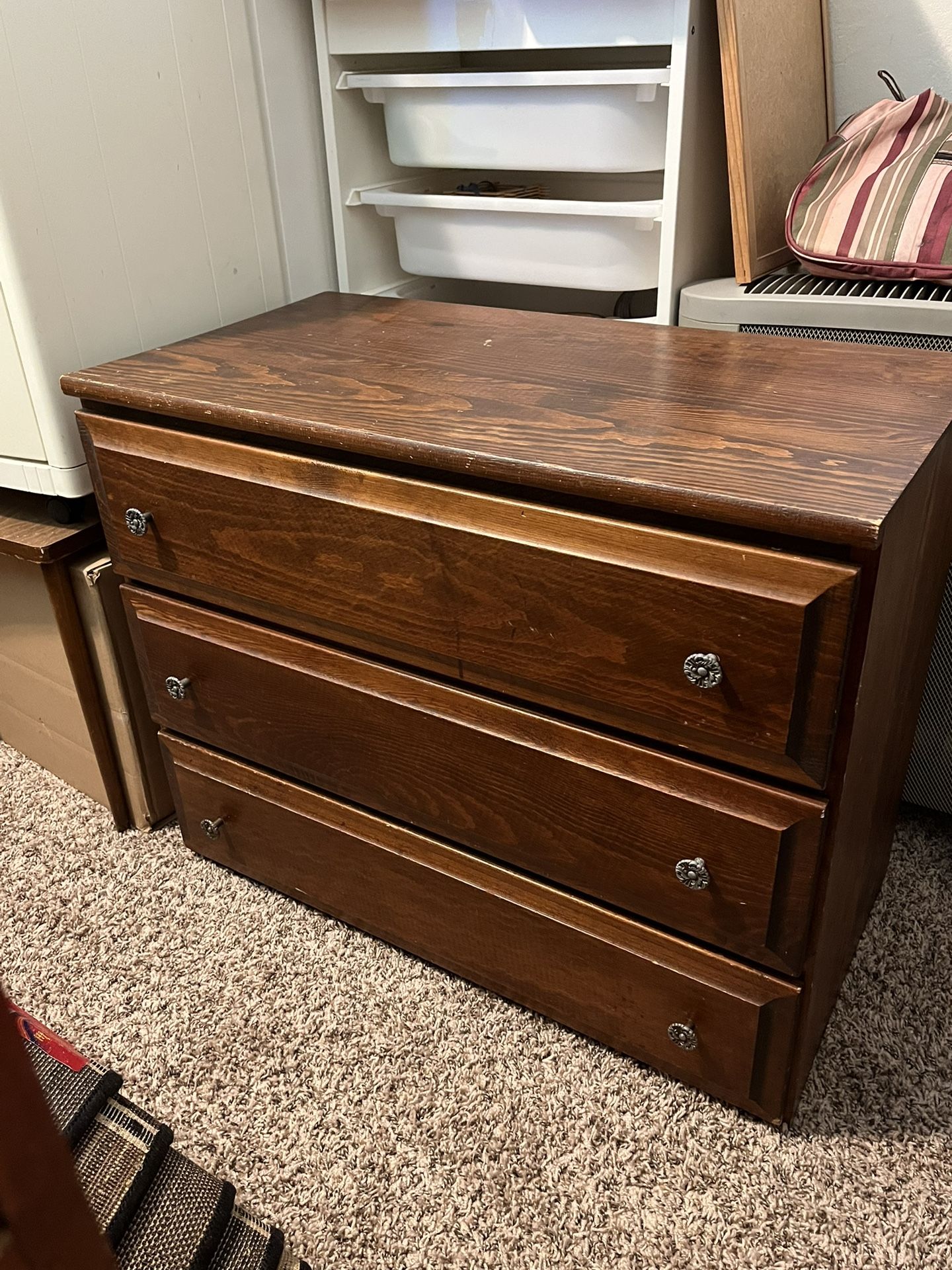 Three-drawer wooden dresser