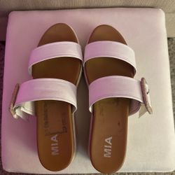white and brown sandals