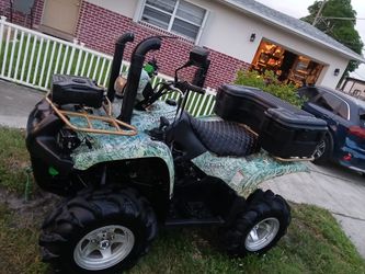 Big boy toys/ 2006 Suzuki vinson 500cc 4x4 lifted mud beast with title