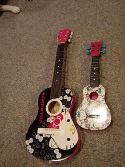 HELLO KITTY GUITAR & YUKALALY BOTH 80 BUCKS