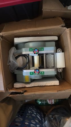 An automatic electric dumpling wrapper maker (or dumpling skin machine)